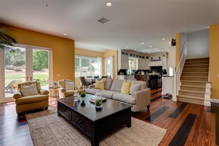 12751 Blue Heron Circle Ojai, CA 93023 - Photo 4 of 22 a living room with furniture wooden floor and a large window