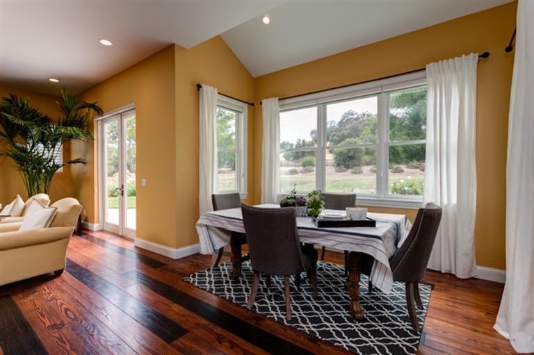 12751 Blue Heron Circle Ojai, CA 93023 - Photo 6 of 22 a dining room with furniture wooden floor and a chandelier