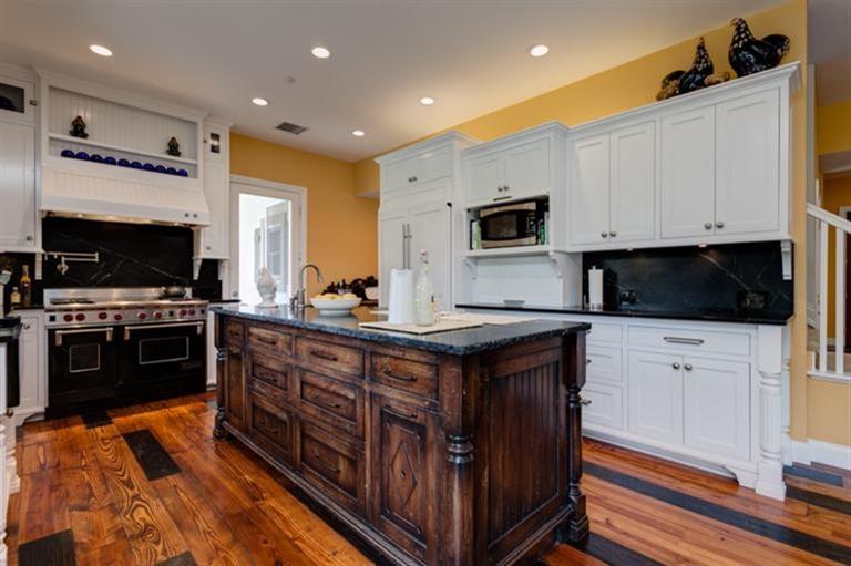 12751 Blue Heron Circle Ojai, CA 93023 - Photo 7 of 22 a kitchen with stainless steel appliances granite countertop a stove a sink and a microwave