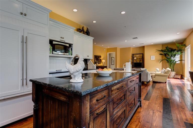 12751 Blue Heron Circle Ojai, CA 93023 - Photo 8 of 22 a kitchen with stainless steel appliances granite countertop a sink a stove and a refrigerator