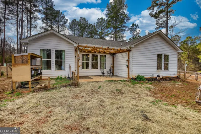 a front view of a house with yard