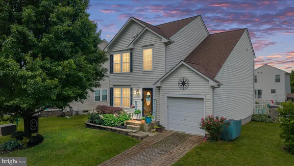 a house view with a garden space