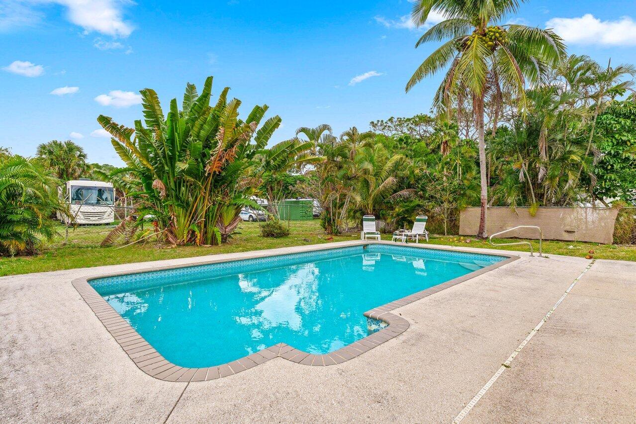 5931 Dryden Road, Unit B West Palm Beach, FL 33415 - Photo 15 of 16 Pool exterior