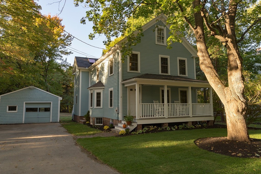 4 Prospect Road Andover, MA 01810 - Photo 1 of 30 a front view of a house with a garden and trees
