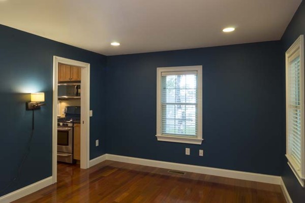 4 Prospect Road Andover, MA 01810 - Photo 17 of 30 a view of an empty room with wooden floor and a window