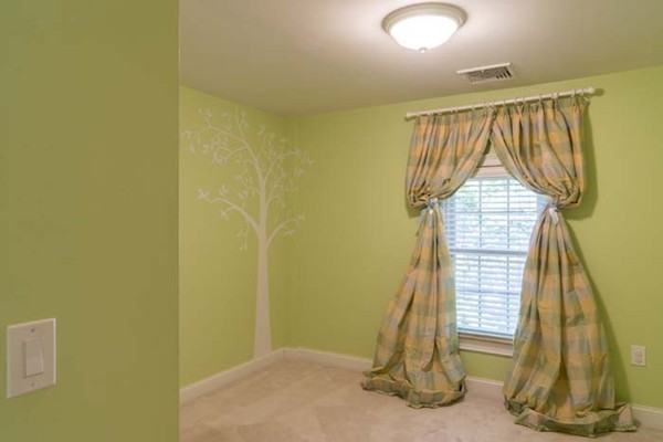 4 Prospect Road Andover, MA 01810 - Photo 25 of 30 a view of a room with a wooden floor and windows