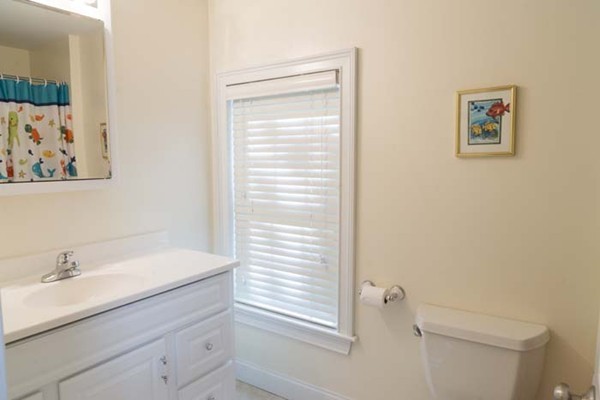 4 Prospect Road Andover, MA 01810 - Photo 26 of 30 a bathroom with a shower sink and toilet