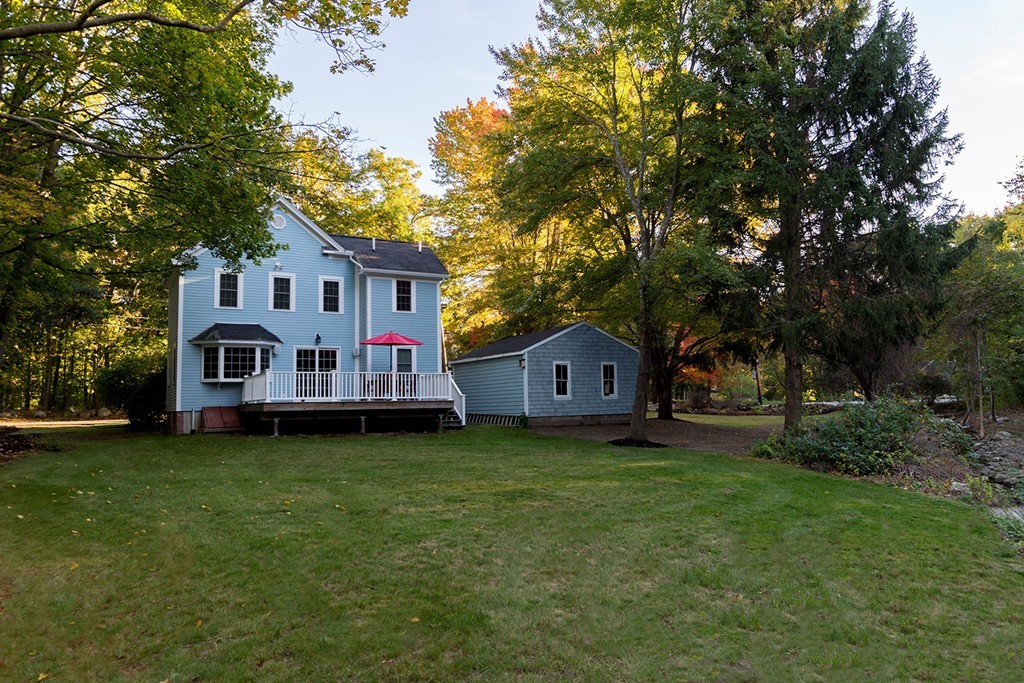 4 Prospect Road Andover, MA 01810 - Photo 27 of 30 a view of a house with a big yard and large trees