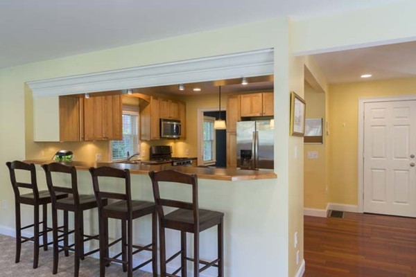 4 Prospect Road Andover, MA 01810 - Photo 7 of 30 a view of a dining room with furniture and wooden floor