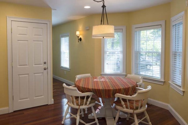 4 Prospect Road Andover, MA 01810 - Photo 10 of 30 a view of a dining room with furniture window and wooden floor