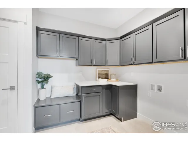 a view of a kitchen with washer and dryer