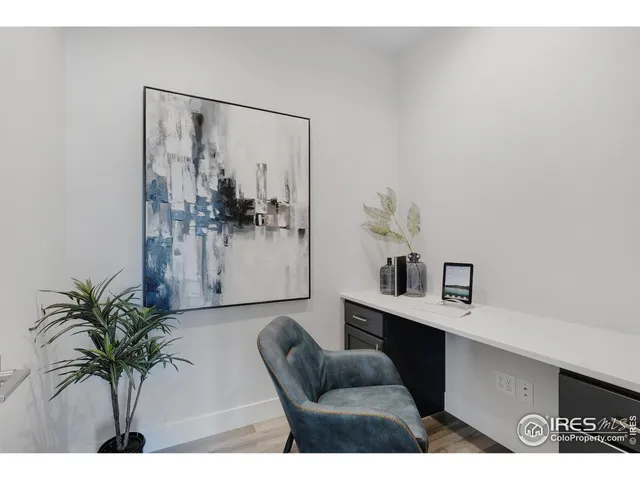 a bed room with a bed and a window