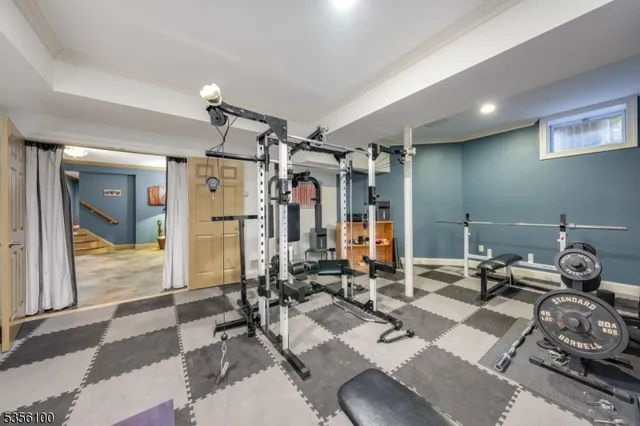 a room with lots of chairs and mirrors