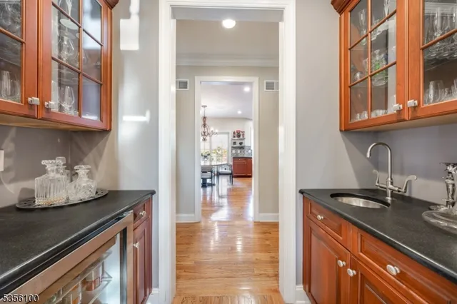 a kitchen with stainless steel appliances granite countertop a stove and a sink