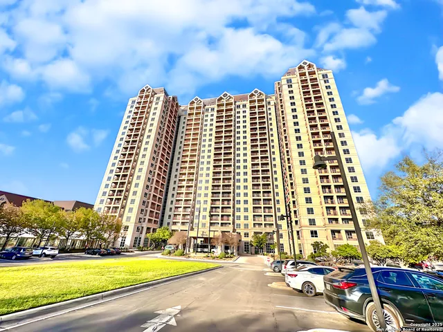 a view of a city with tall buildings