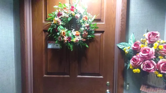 a view of a hallway with a chandelier