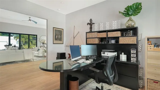 a view of a workspace with furniture