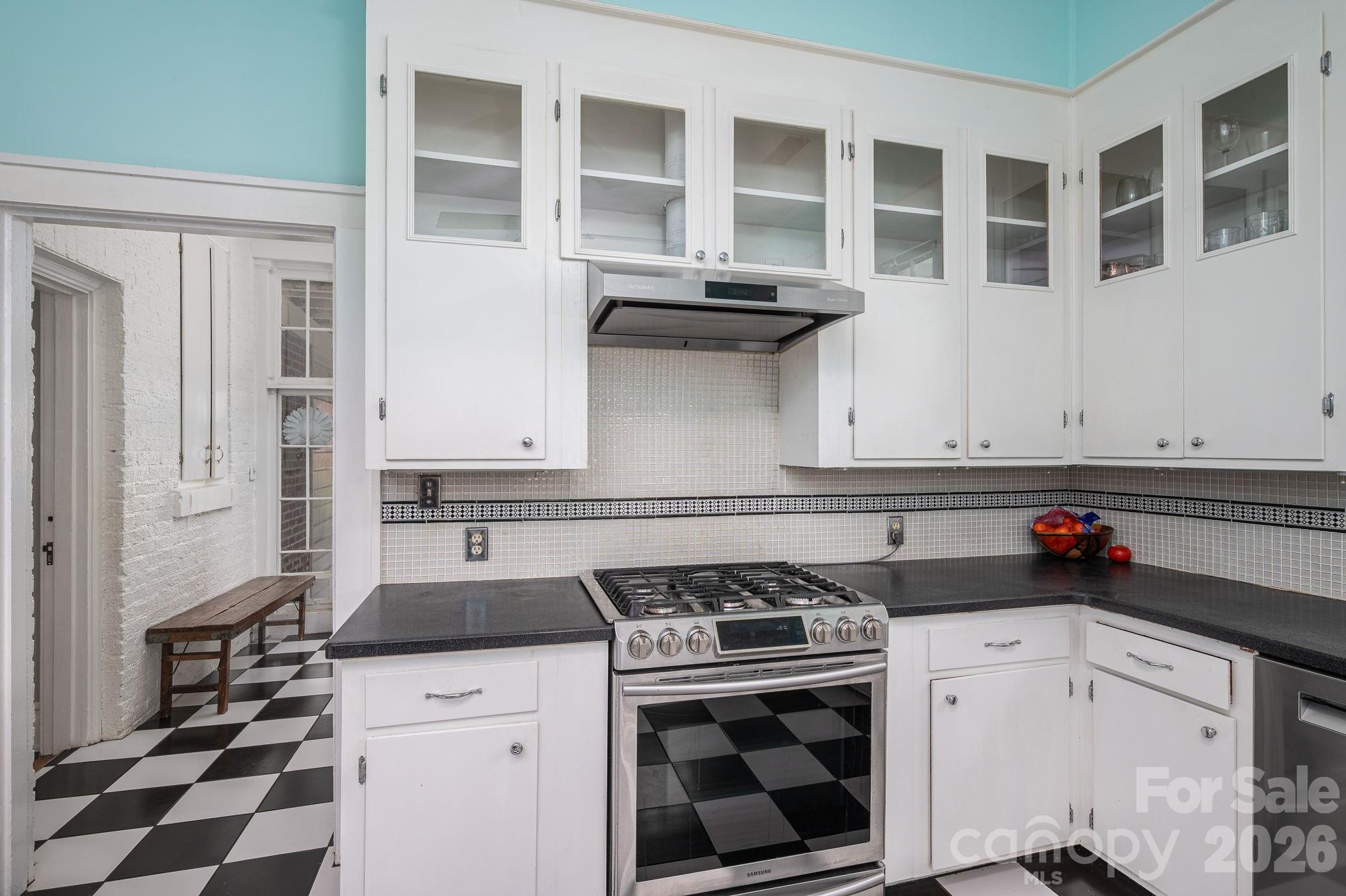 825 Hawthorne Road Shelby, NC 28150 - Photo 22 of 45 a kitchen with stainless steel appliances granite countertop a stove and a refrigerator