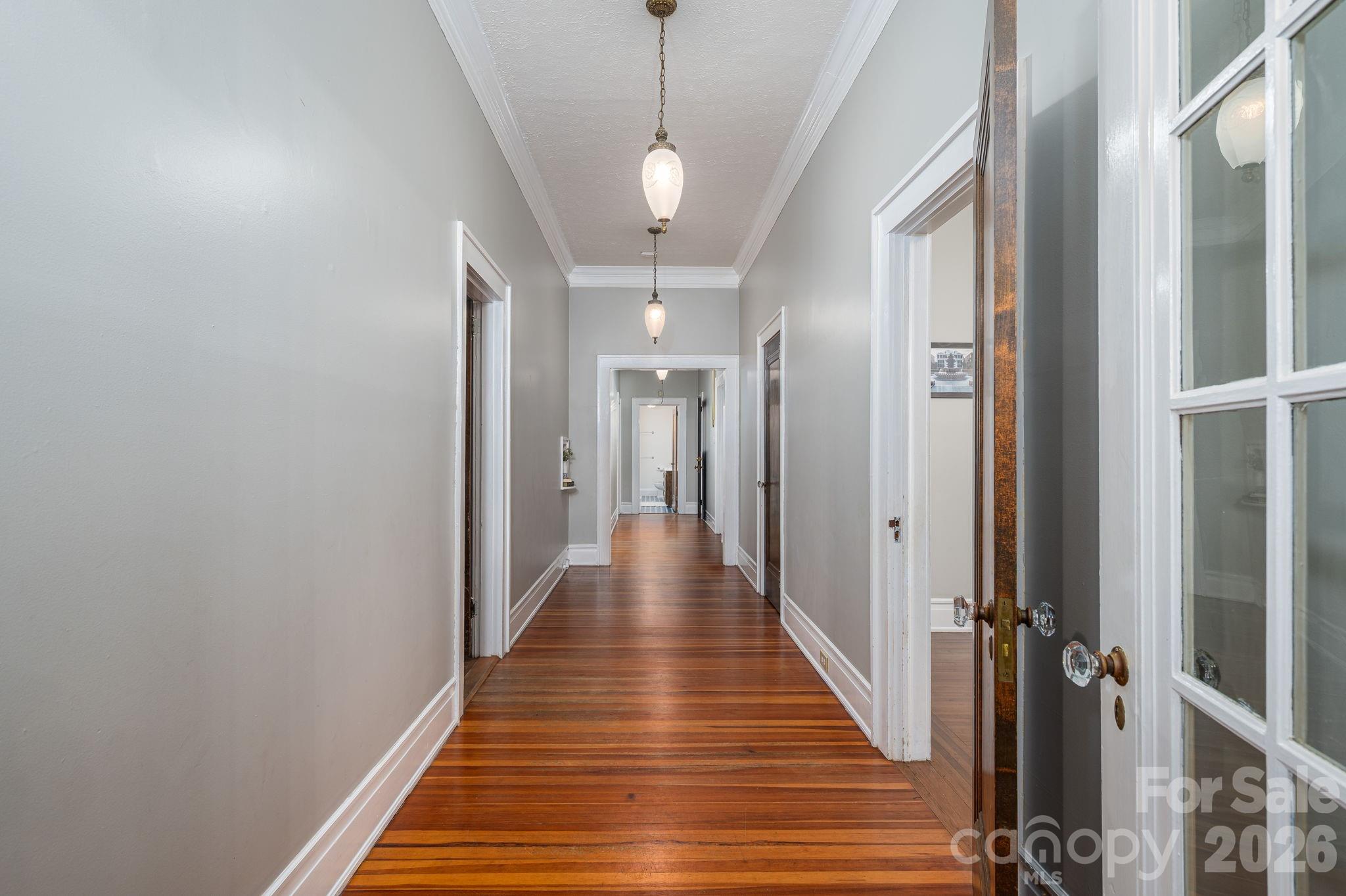 825 Hawthorne Road Shelby, NC 28150 - Photo 23 of 45 a view of a hallway with wooden floor and staircase