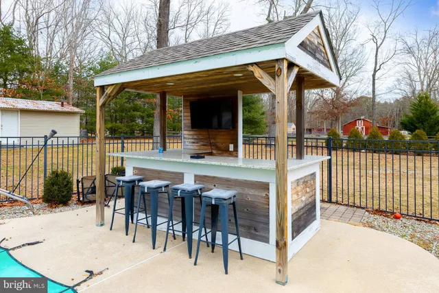 a view of staircase with wooden floor