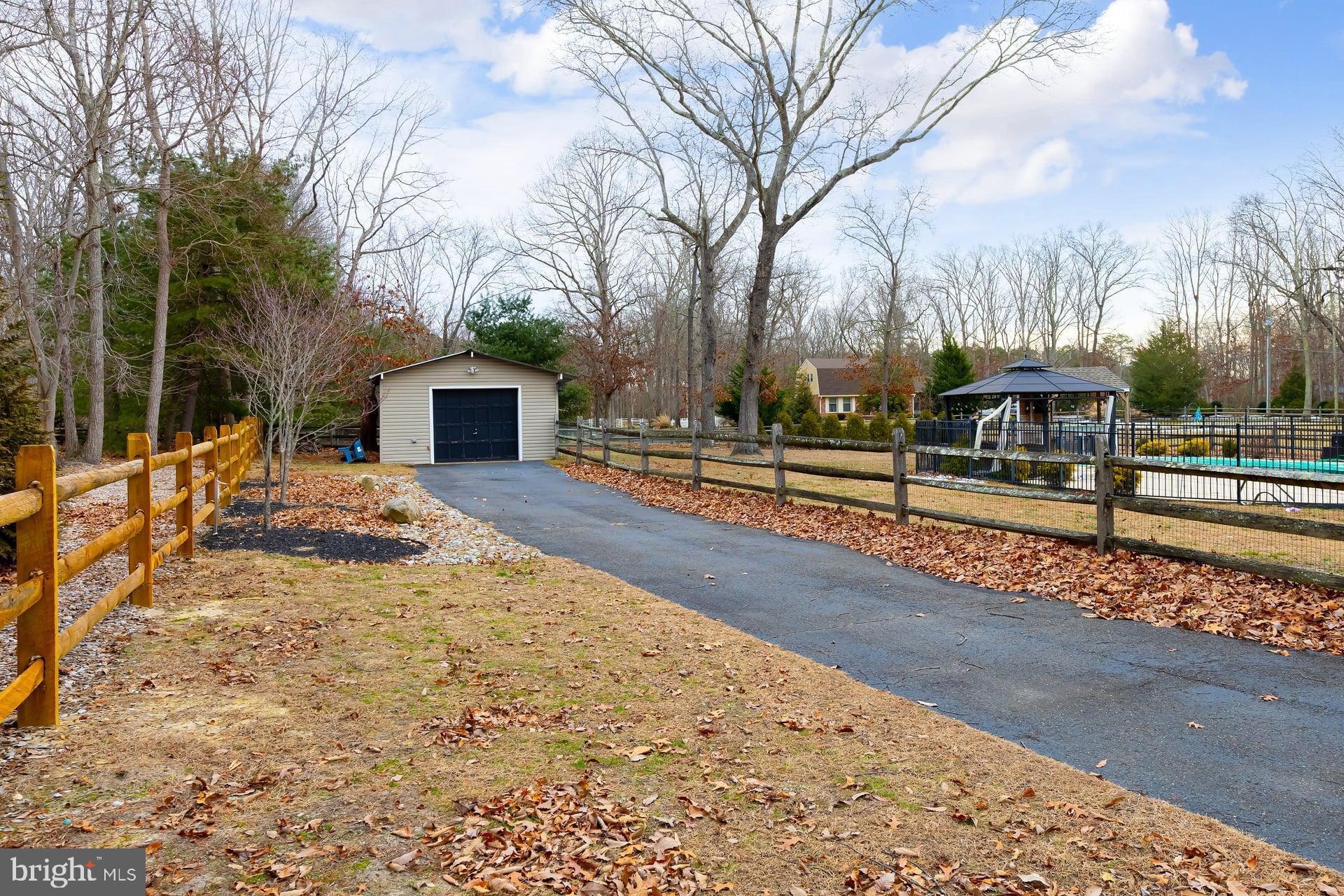 326 Pricketts Mill Road Tabernacle, NJ 08088 - Photo 24 of 62 Serene driveway leading to a charming garage.