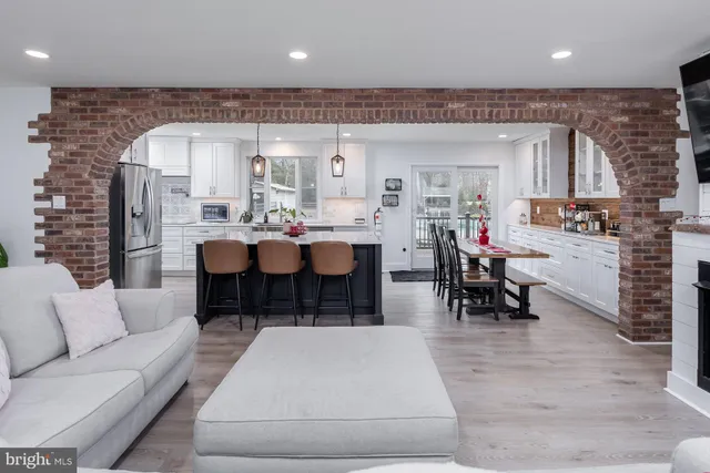 a bedroom with a bed and a lamp