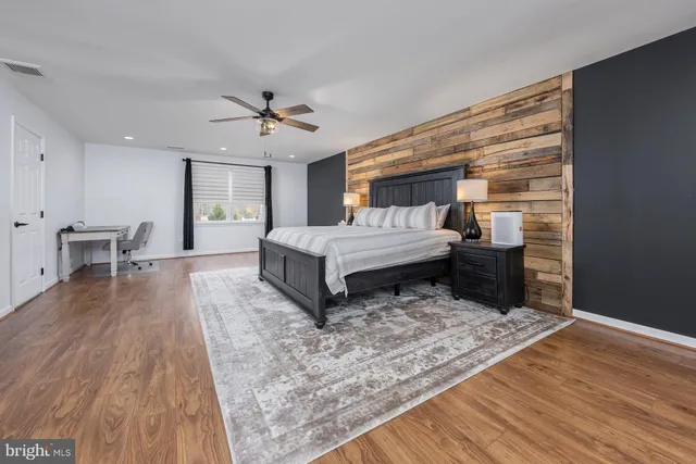 a room with furniture and a pool table