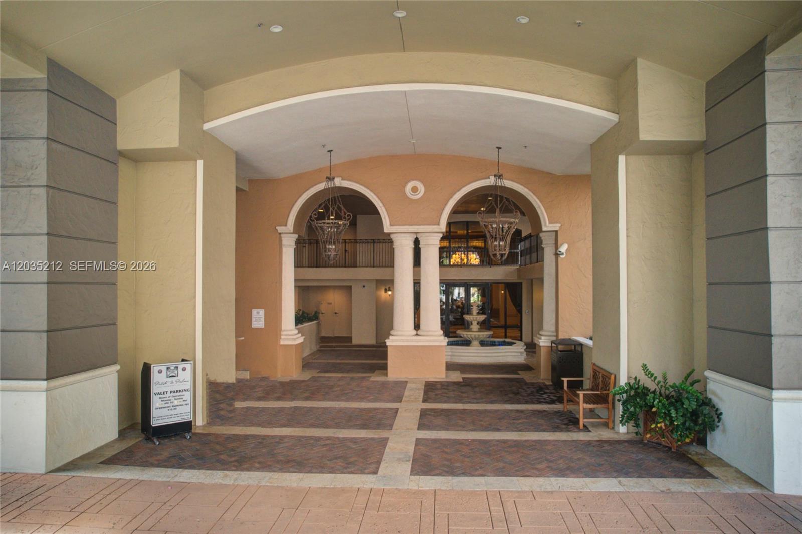 888 Douglas Road, Unit 302 Coral Gables, FL 33134 - Photo 46 of 51 PUERTA DE PALMAS FRONT ENTRANCE