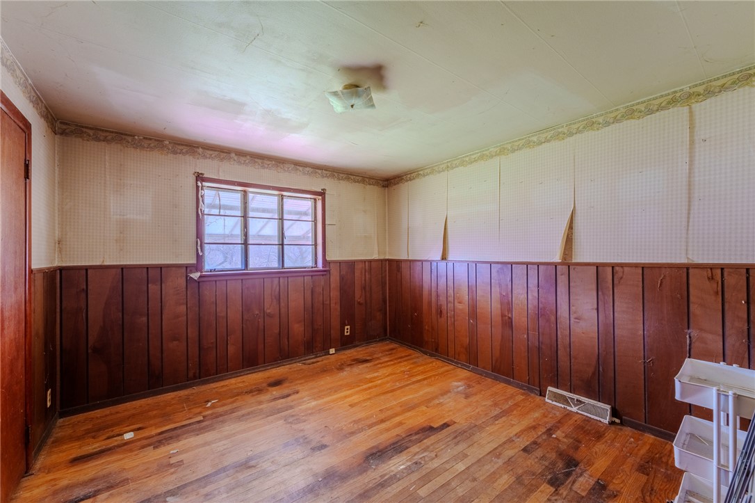 7315 Franklin-Trenton Road Franklin, OH 45005 - Photo 6 of 15 This cozy room offers hardwood floors and natural light, ready for your personal touch.