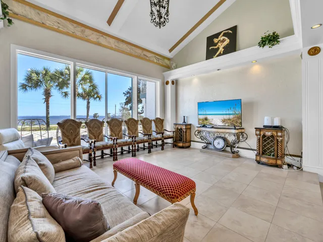 a kitchen with stainless steel appliances kitchen island granite countertop a sink and a stove