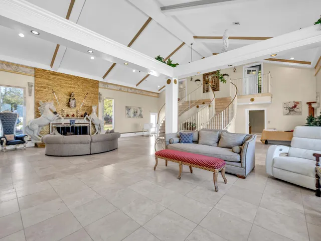 a kitchen with a sink and a large window