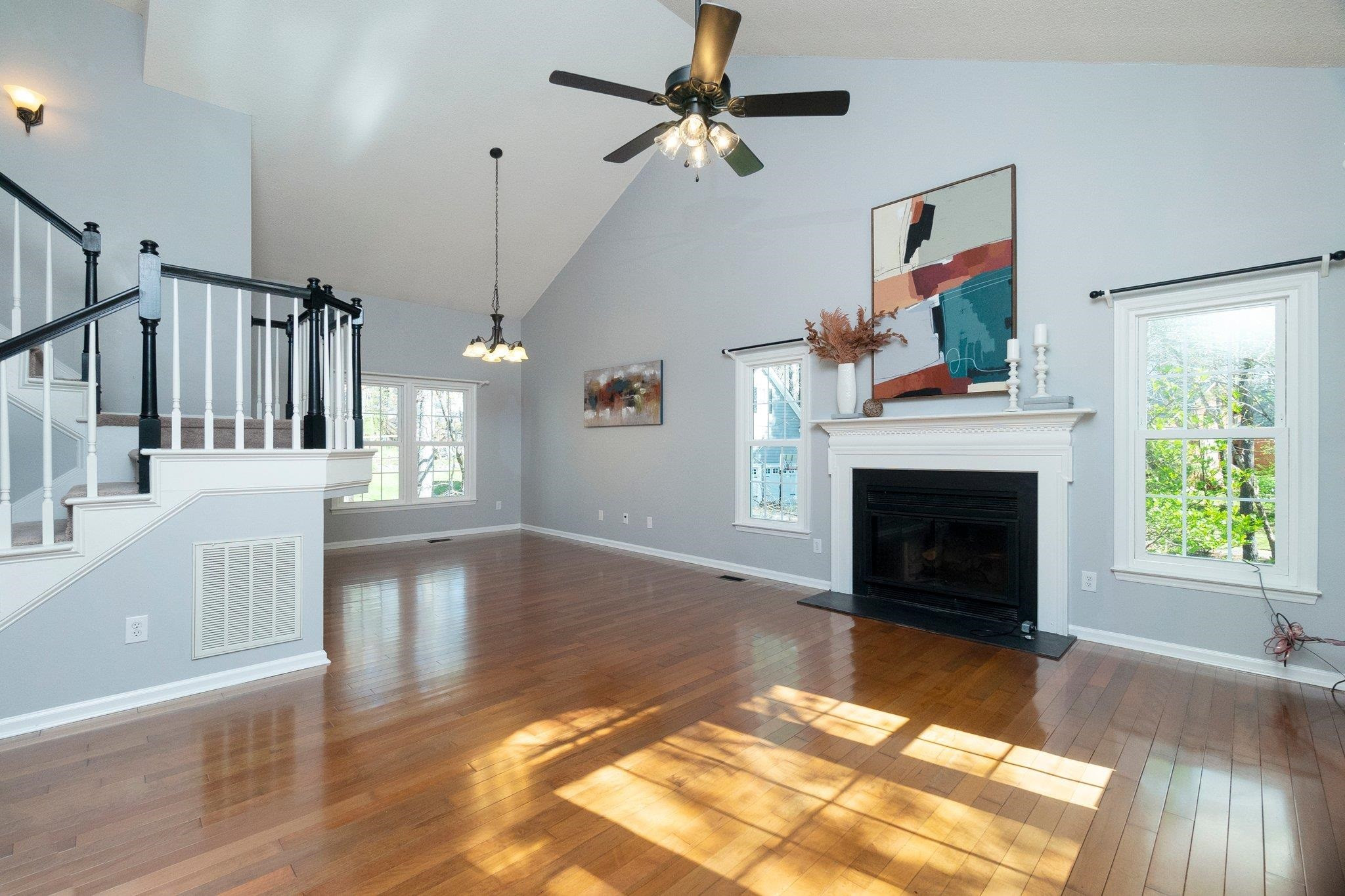 102 Waverly Place Durham, NC 27713 - Photo 3 of 12 a living room with furniture and a fireplace