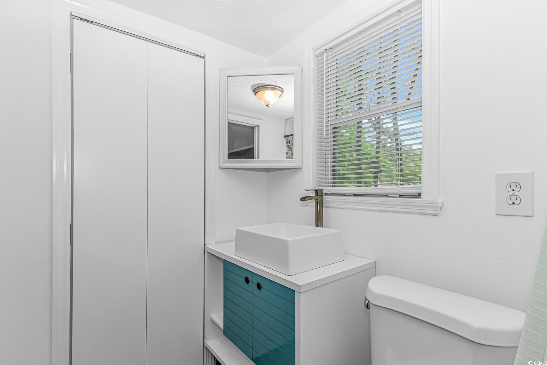 159 Offshore Drive Murrells Inlet, SC 29576 - Photo 15 of 35 Half bathroom featuring toilet and vanity