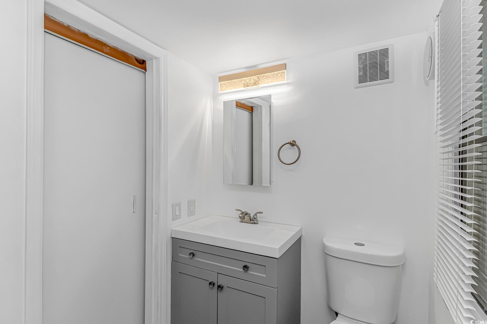 159 Offshore Drive Murrells Inlet, SC 29576 - Photo 19 of 35 Bathroom featuring vanity and toilet