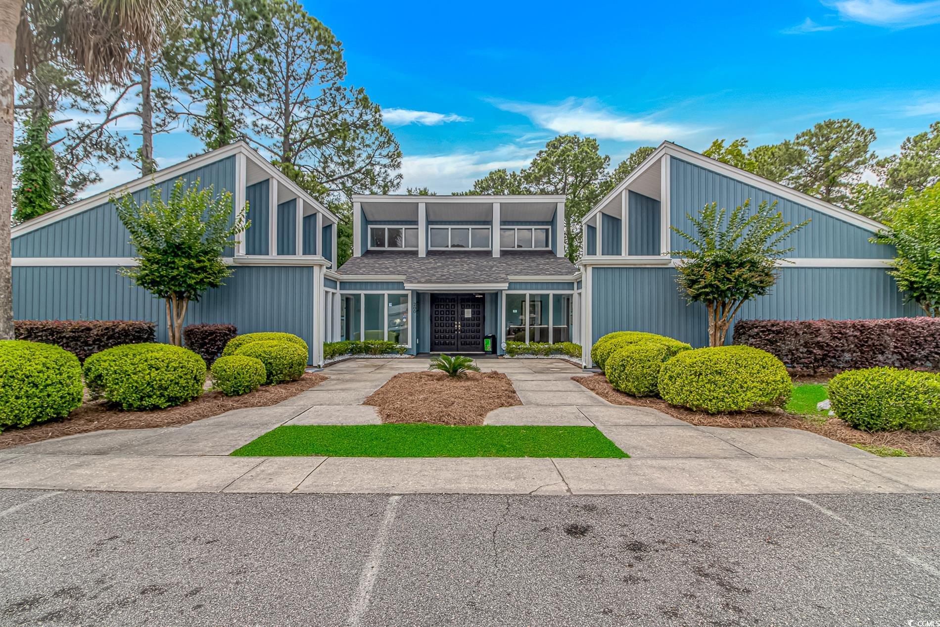 159 Offshore Drive Murrells Inlet, SC 29576 - Photo 34 of 35 Mid-century inspired home featuring a shingled roof