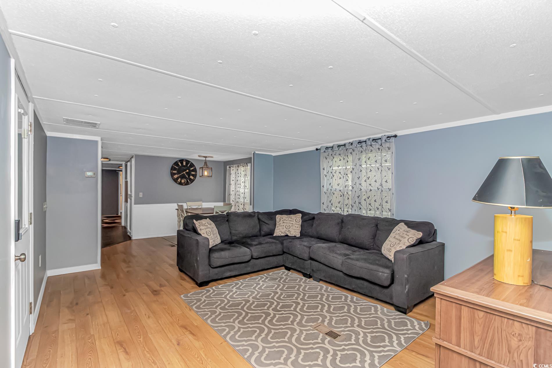 159 Offshore Drive Murrells Inlet, SC 29576 - Photo 5 of 35 Living area featuring light wood-style floors