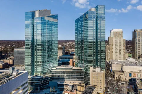 a city view with tall buildings