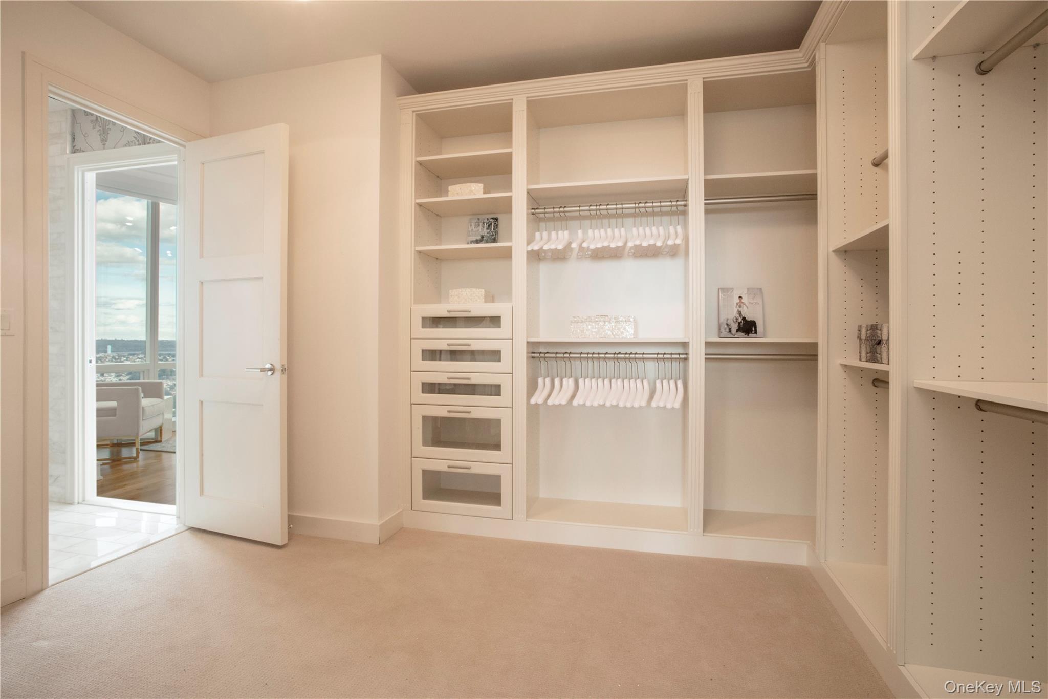 1 Renaissance Square, Unit PH4CD White Plains, NY 10601 - Photo 18 of 25 an empty room with wooden floor and windows