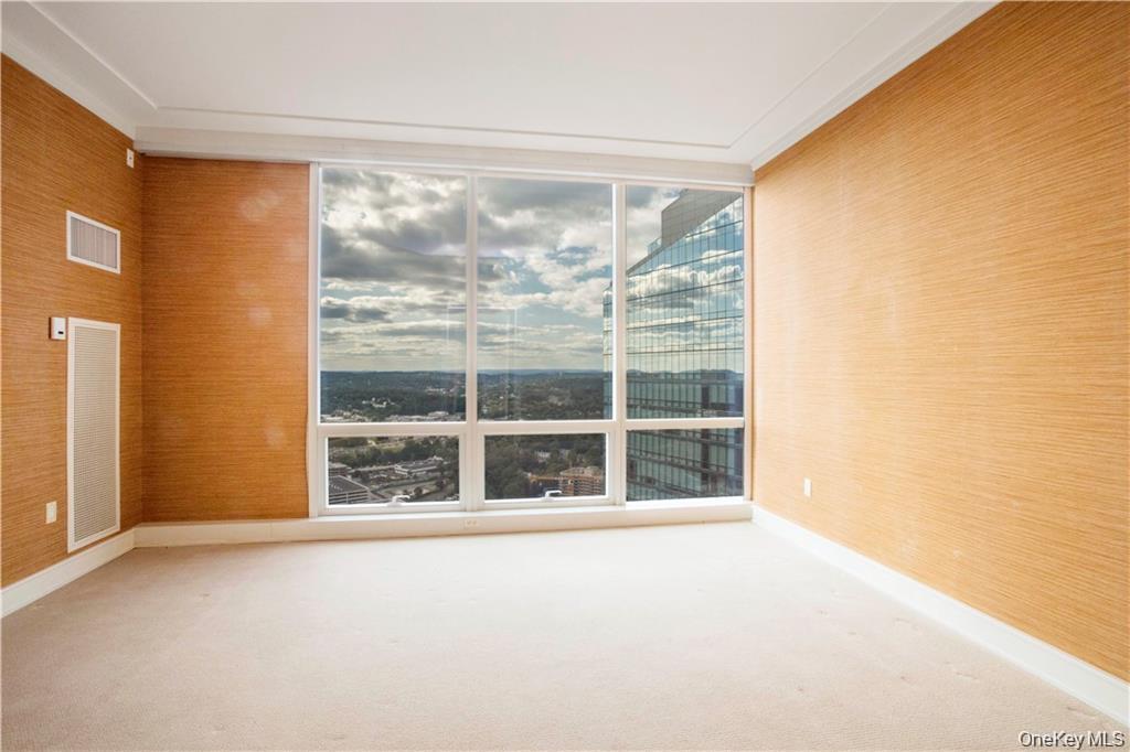 1 Renaissance Square, Unit PH4CD White Plains, NY 10601 - Photo 21 of 25 a view of an empty room with a window