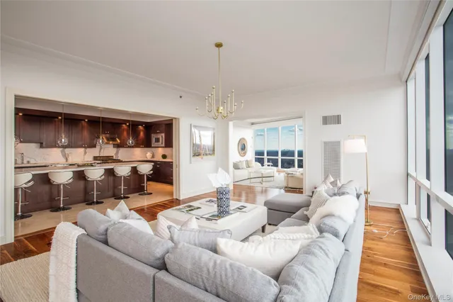 a living room with furniture and a rug