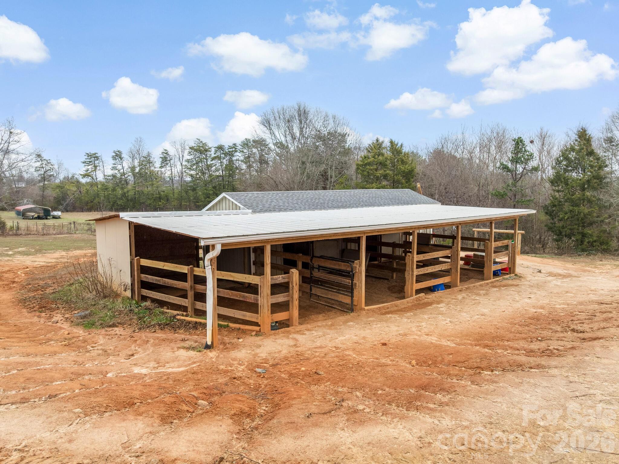 159 Big Island Road Forest City, NC 28043 - Photo 8 of 37 a view of a house with a backyard and a space