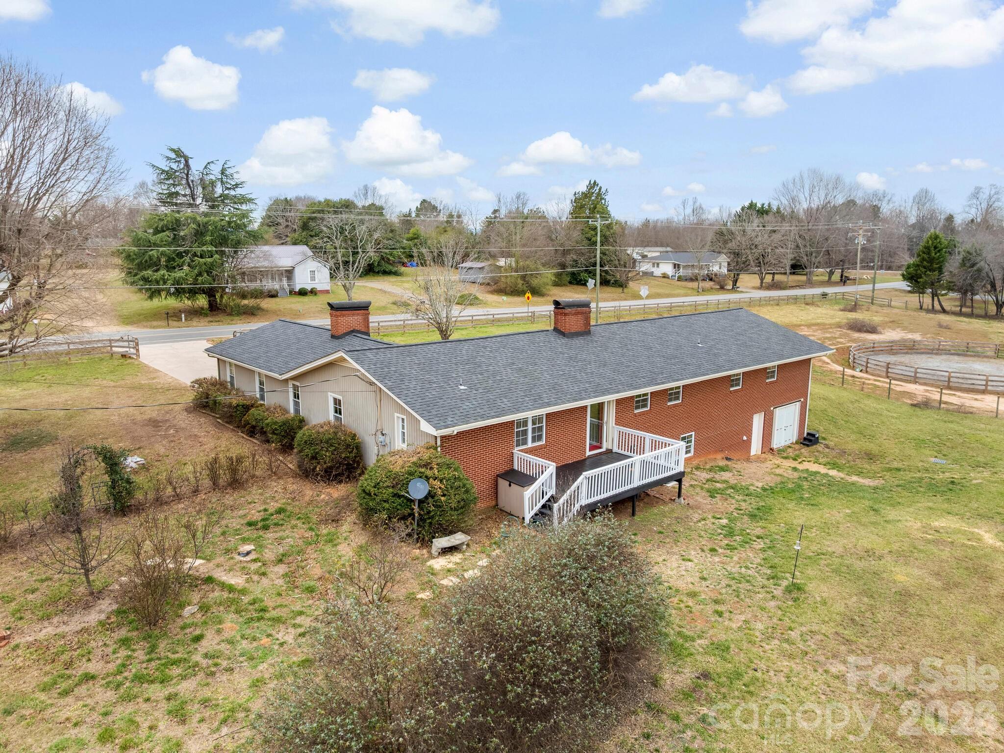 159 Big Island Road Forest City, NC 28043 - Photo 10 of 37 a view of a swimming pool with an outdoor space and seating area