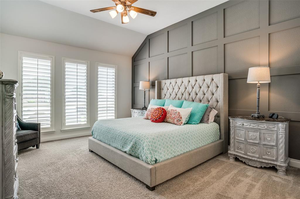 880 Manchester Avenue Prosper, TX 75078 - Photo 16 of 26 a bedroom with a bed a lamp and a large window