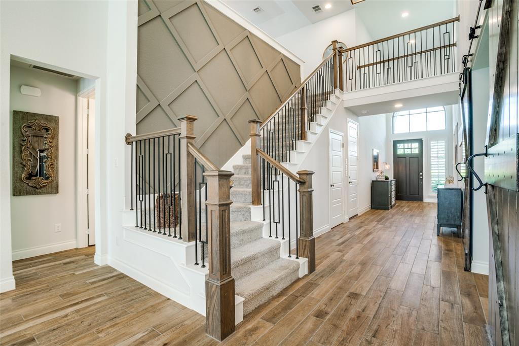880 Manchester Avenue Prosper, TX 75078 - Photo 3 of 26 a view of entryway and hall with wooden floor