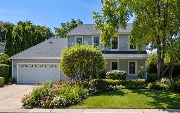 front view of a house with a yard