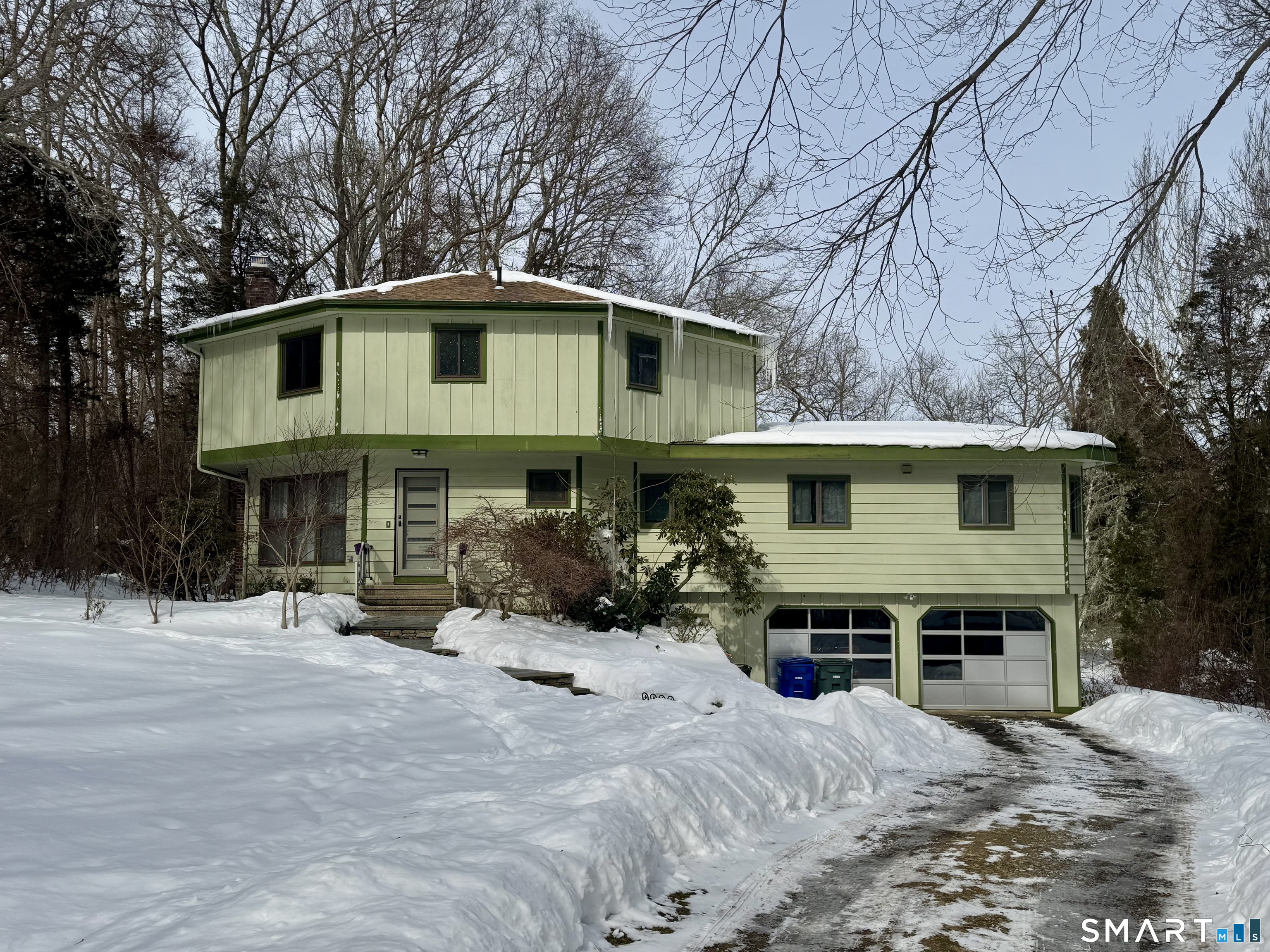 25 Coachman Pike Ledyard, CT 06339 - Photo 11 of 37 a front view of a house with yard
