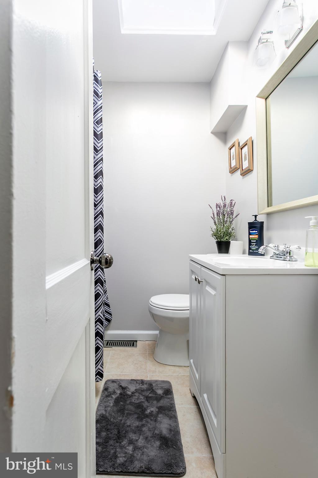 3727 Clarenell Road Baltimore, MD 21229 - Photo 14 of 22 Updated bathroom on top floor.