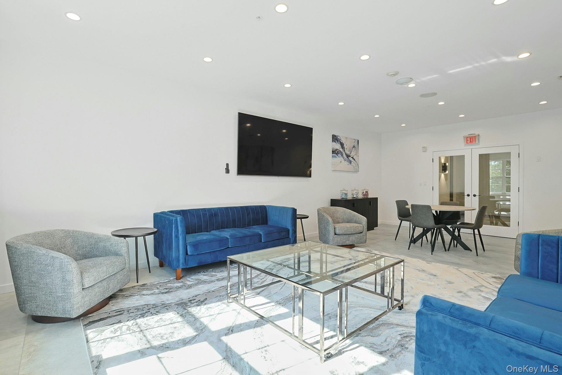 962 Rte 9W, Unit 305 Congers, NY 10920 - Photo 20 of 24 Living area with french doors and recessed lighting