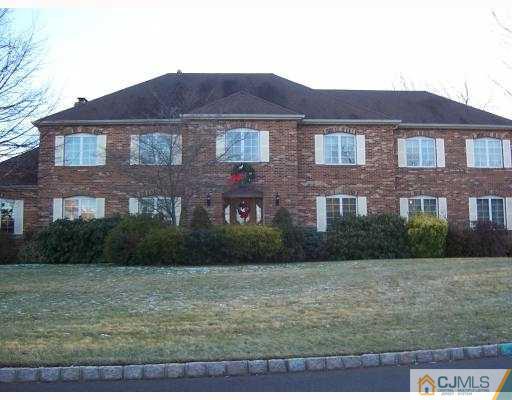 3 Maher Road Somerset, NJ 08873 - Photo 1 of 8 a view of a brick house with a yard