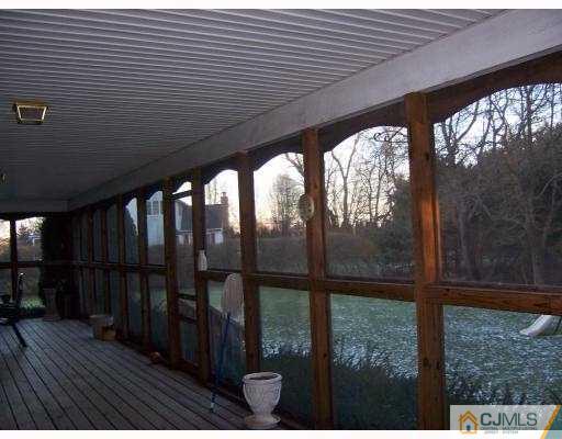 3 Maher Road Somerset, NJ 08873 - Photo 2 of 8 a view of porch with wooden floor